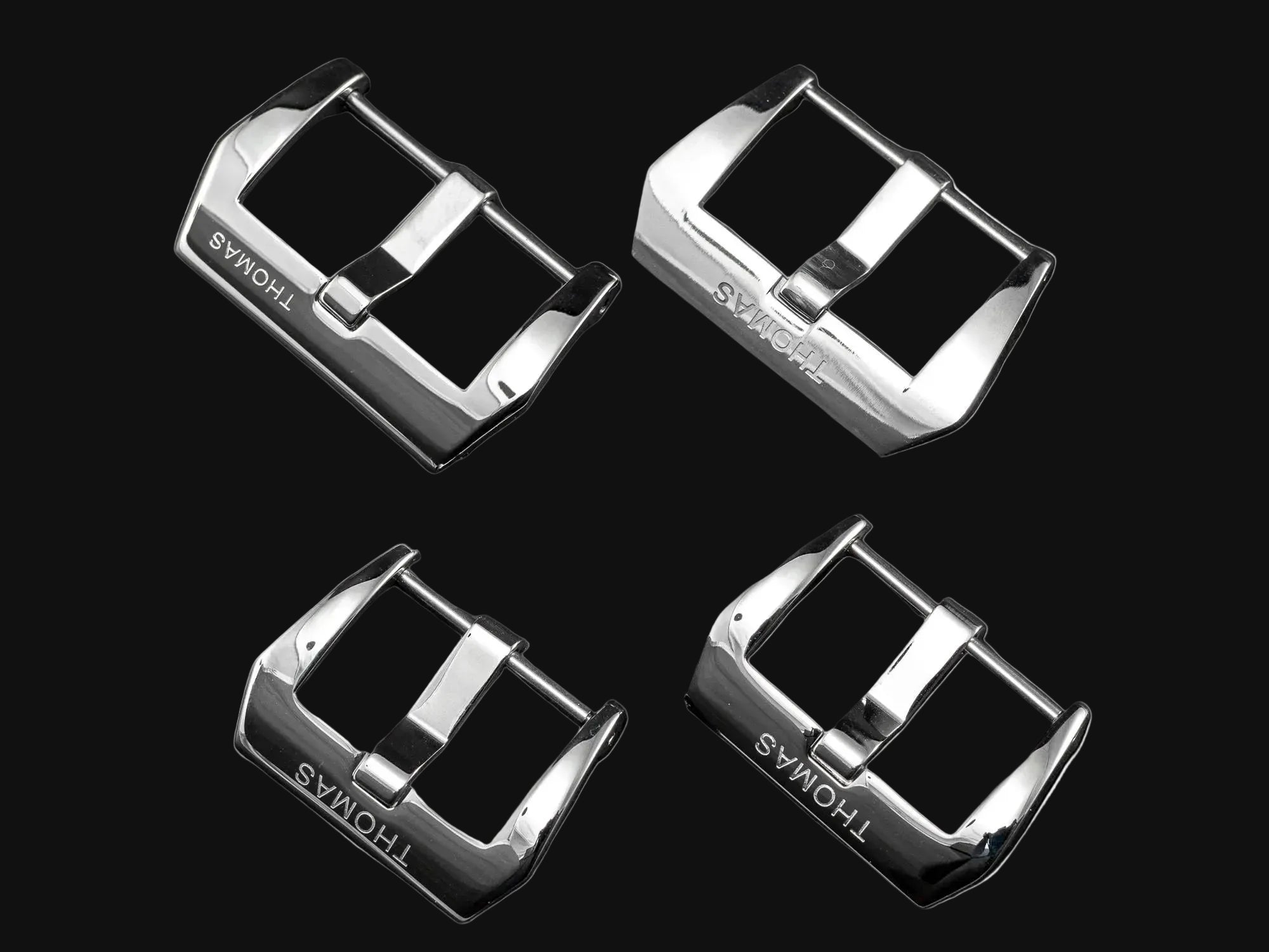 Four silver watch strap buckles with different widths on a dark background, branded 'THOMAS'.